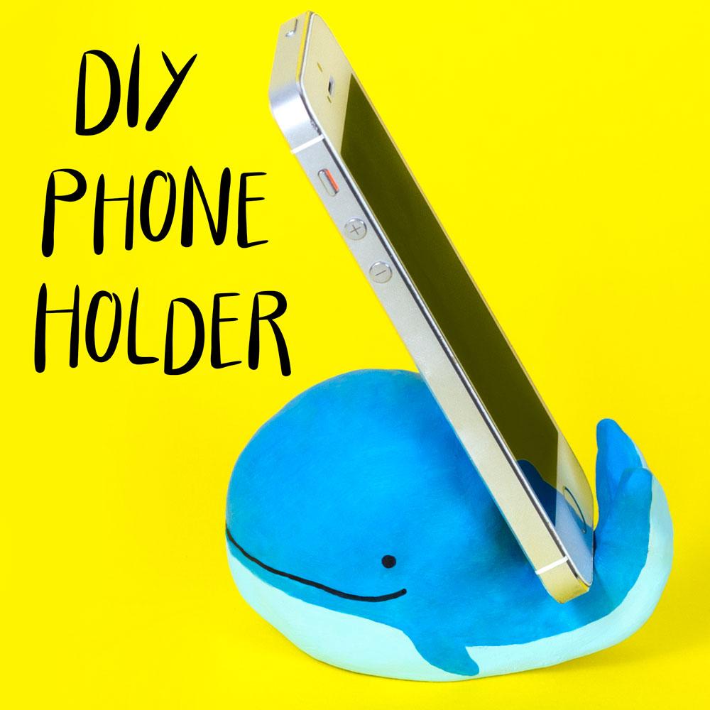 Image of whale phone holder and a phone