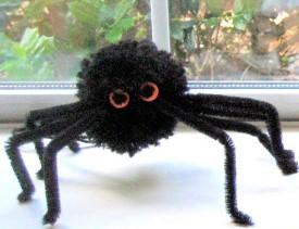 Image of black spider made using pom poms and pipe cleaners