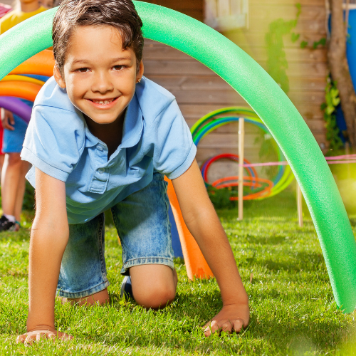 Example of a child going under a semi hoop obstacle